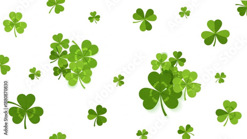 Green four leaf clovers scattered on white background symbolizing luck and nature