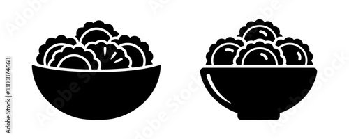 Two black bowls filled with delicious dumplings, a culinary delight
