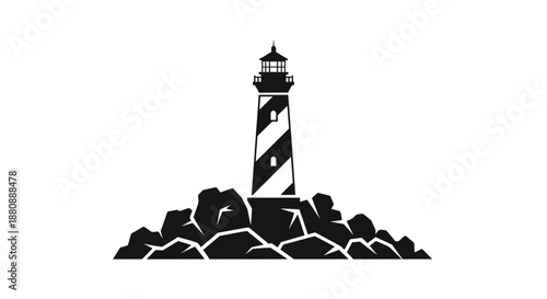Black and white lighthouse on rocks.