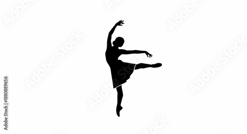 Silhouette of a female ballet dancer.