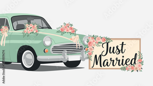 Vintage car with just married sign and floral decorations in soft pastel colors
