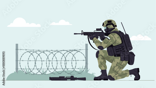 Soldier in combat gear kneeling with rifle near barbed wire fence