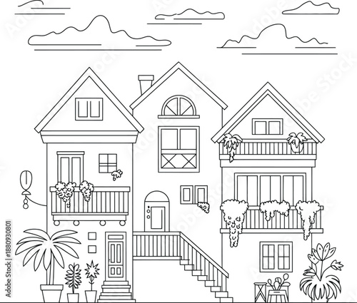 Three houses with balconies and plants in a tropical setting