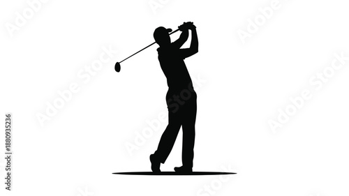 A golfer in mid swing captured as a dramatic black silhouette