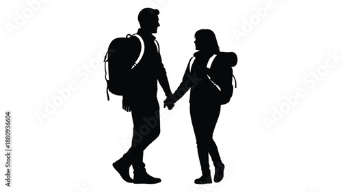 Couple hiking together with backpacks holding hands a striking silhouette