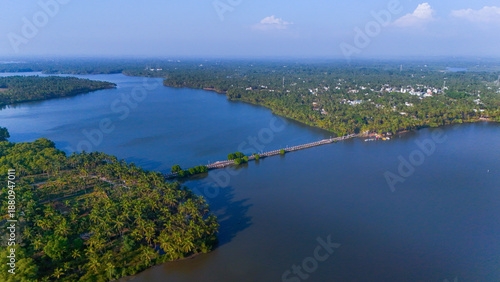 Wallpaper Mural Scenic travel destination Beautiful Road shot showcasing the winding waterways, coconut palms, and rural beauty of God's Own Country, Kerala. Torontodigital.ca
