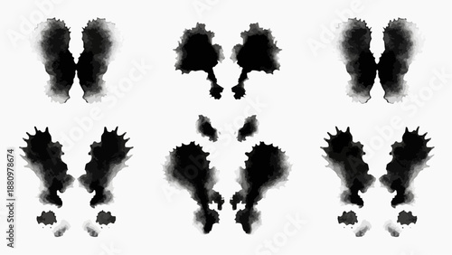 Abstract black ink splatters arranged in a grid pattern on a neutral background, viewed from directly above, showcasing fluid dynamics and artistic expression