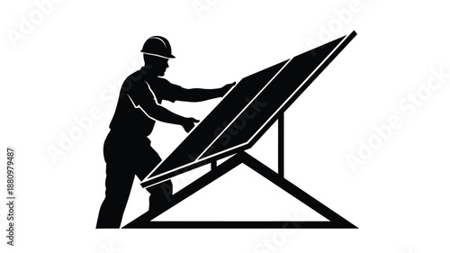 Architect reviewing blueprints at a drafting table a striking silhouette