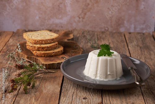 Tableau sur toile Fresh Cheese From Burgos Served With Bread on Wooden Table