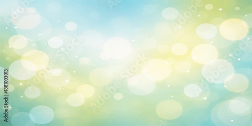 A soft blue and green holiday wallpaper features a glowing bokeh pattern with bright illuminated circles and a blurred nature backdrop for a festive Christmas design