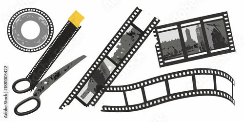 Film strips scissors and a reel tools of cinematic creation