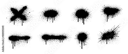 Set of black spray paint drips and splatters isolated on white background. Grunge graffiti design elements for urban street art texture.