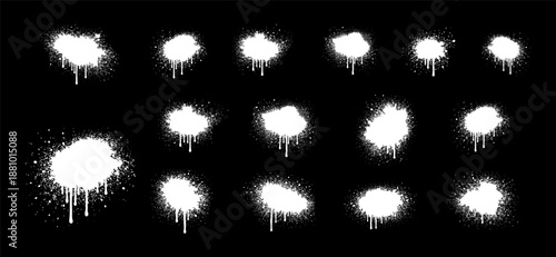 A collection of various white spray paint splatters and drips on a solid black background, ideal for street art and urban designs.