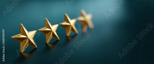 Close-up of five golden stars arranged in a row on a dark teal surface with shallow depth of field and soft lighting