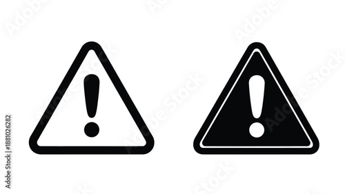 Two black and white triangular warning signs with exclamation points displayed