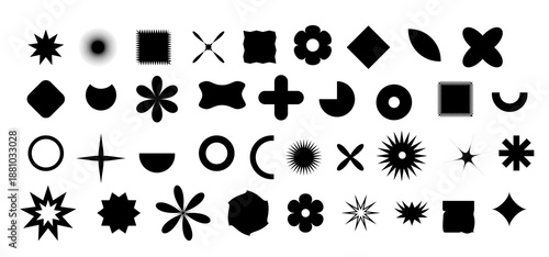 Black shapes and patterns arranged in rows on a white background displayed in an art or design context showing various forms and designs