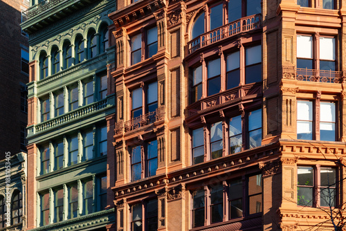 Canvas Print Cast-iron and brick facades along Broadway in the NoHo Historic District of Lower Manhattan, featuring architectural detail