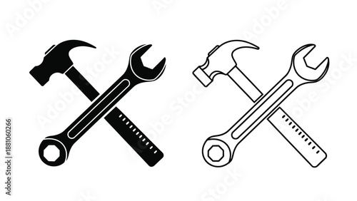 A crossed arrangement of hammer and wrench tools in black and white