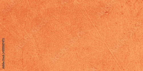 Aged orange paper and wood texture background featuring a vintage grunge pattern on a rough antique wall surface with brown cardboard and parchment material design