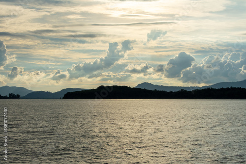 Beautiful Sunset sky, sun and clouds over Andaman Sea in Thailand. 
