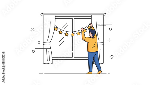 Young caucasian male decorating window with star garland