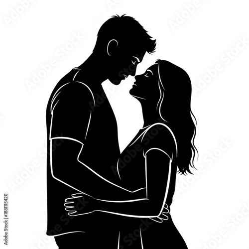 Silhouette of a romantic couple embracing and about to kiss