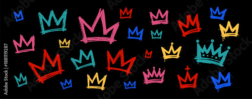 Vibrant street art banner featuring colorful graffiti crowns on a black background. Stylish grunge crown set for urban design projects.