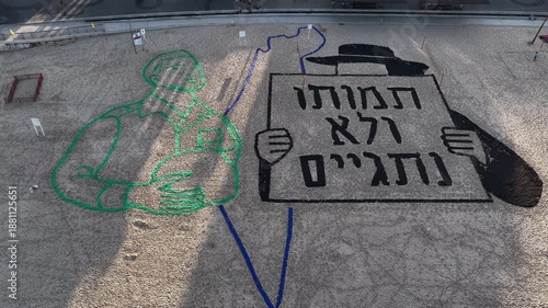 Aerial Ultra Orthodox Anti Draft Protest Art Tel aviv

Drone footage shows large anti draft artwork opposing Haredi enlistment Tel aviv
January 1 2026 Israel

