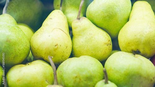 Photography A bunch of green pears are piled up