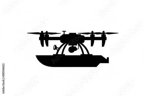 Drone Over Water: A sleek drone takes flight over water, showcasing aerial technology and innovation in a minimalist silhouette.