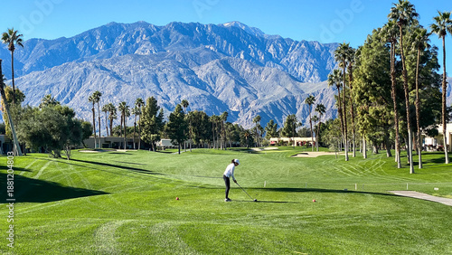 Woman Golfer Teeing Off on Palm Springs Golf Course