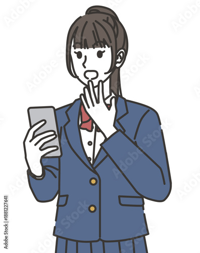 スマホを見て驚く女子高校生