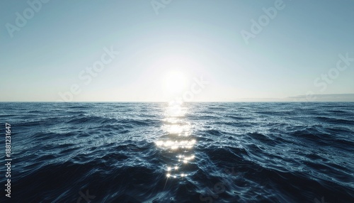 Sunlight reflecting on rippling ocean waves during a serene daytime setting