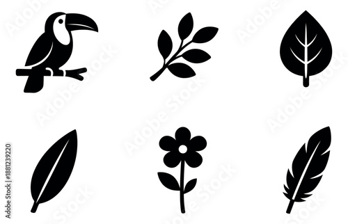 Silhouette nature icons set featuring a toucan, various leaves, a flower, and a feather for environmental designs