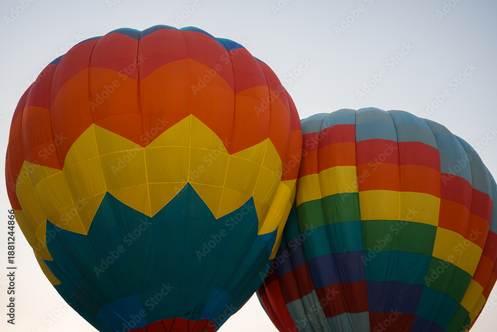 Fototapeta premium colorful hot air balloons glowing against sky