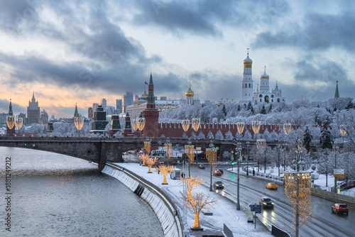Moscow Kremlin and the ensemble of the Kremlin Cathedral Square against the backdrop of the Bolshoy Moskvoretsky Bridge over the Moskva River, Moscow, Russia