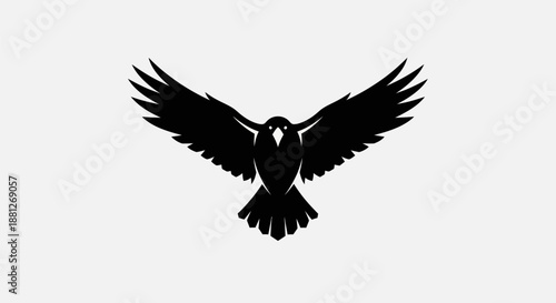 Black bird silhouette with wings spread against white background