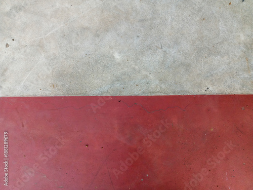 Fotografia Abstract surface texture with a distinct division between a light grey area and