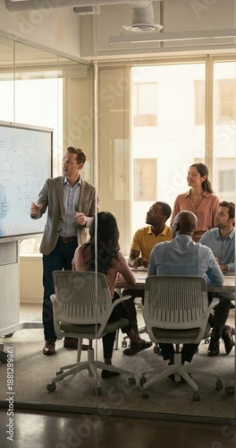 Business presentation with diverse team in modern meeting room