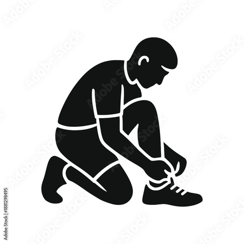 A player shoe fixing silhouette vector icon