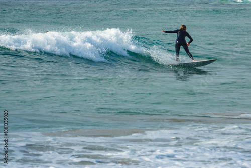 Woonona Beach north of Wollongong, New South Wales, Australia, with a family friendly sandy shoreline, ocean surf, calm swimming areas and the elevated Woonona Rock Pool, photographed January 3, 2026.