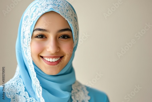 Wallpaper Mural Young woman wearing a bright blue head covering with white lace smiles sincerely Torontodigital.ca