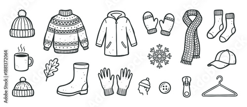 Hand-drawn black and white doodle set of winter and autumn clothing items, including a cozy sweater, warm jacket, beanie, scarf, mittens, and boots in a simple sketch style