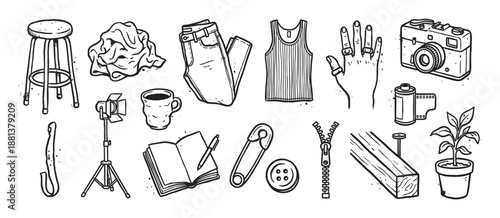 Collection of hand-drawn doodle illustrations featuring various creative and lifestyle objects like a camera, clothing, and art supplies in a black and white sketch style