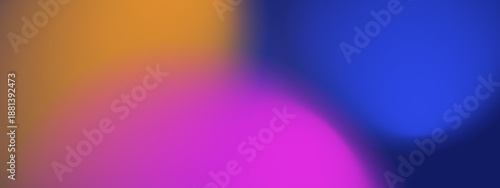 Abstract artistic background with soft blurry spots of orange pink and blue colors creating a dreamy out of focus effect