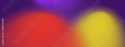 Abstract background with soft out of focus spheres in purple red and yellow tones creating a warm glowing atmosphere