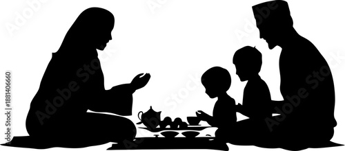 Silhouette of a Muslim Family Having Suhoor or Iftar Meal Together
