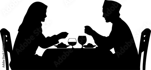 Silhouette of a Muslim Family Having Suhoor or Iftar Meal Together
