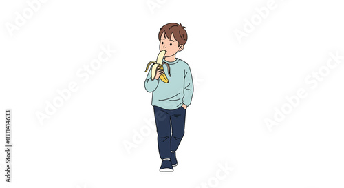 Young boy in a light blue sweater and dark pants walking while peeling and eating a fresh yellow banana for a healthy snack on a white background.
