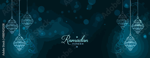 Ramadan Kareem greeting banner with Islamic lanterns and bokeh effect on a dark blue background, ideal for cultural and religious celebrations